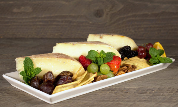 Cheese Platter Featuring Van Sormon, Truffle Gold and Horseradish Pecan Cheddar